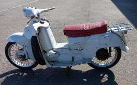 A vintage Moto Guzzi Galletto 1966 Scooter with documentation and a number of spares -