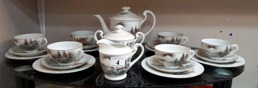 A Japanese egg shell china tea set with Geisha in bottom of tea cups