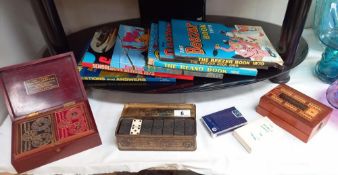 An early mahogany boxed Bezique card game with inlaid folding cribbage board, cards, tin dominoes
