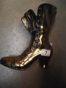 A large vintage brass ladies Victorian style boot match holder height 25cm