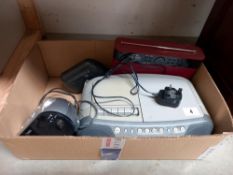 A Sony cd/radio/tape player, Bush radio, Timex alarm clock and 1 other