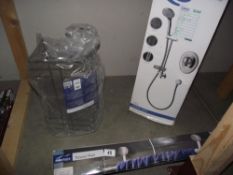 A boxed Ideal standard shower pack, shower rack and a towel rail COLLECT ONLY