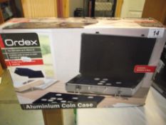 An Ordex aluminium coin case