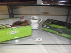 Boxed Lawn aeriator shoes, drip irrigation set, Gardeners mug and 2 duck and a dog wicker planters