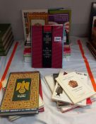 A quantity of books on badges and medals including Waffen SS it's uniforms insignia and equipment