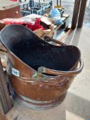 A copper helmet coal scuttle. COLLECT ONLY.