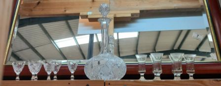 A cut glass decanter and 2 sets of 6 sherry glasses