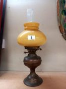 A vintage brass oil lamp