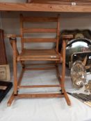 A vintage child's folding rocking chair COLLECT ONLY