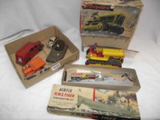 A boxed Arnold Germany bulldozer, Tri-ang Minic including Morris Minor etc