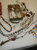 A mixed lot of costume jewellery.