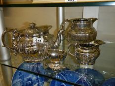 Four pieces of Ridgway silver lustre including teapot, cream jug, water jug and salt pot, c 1820-25.
