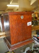 An Edwardian oak writing box.