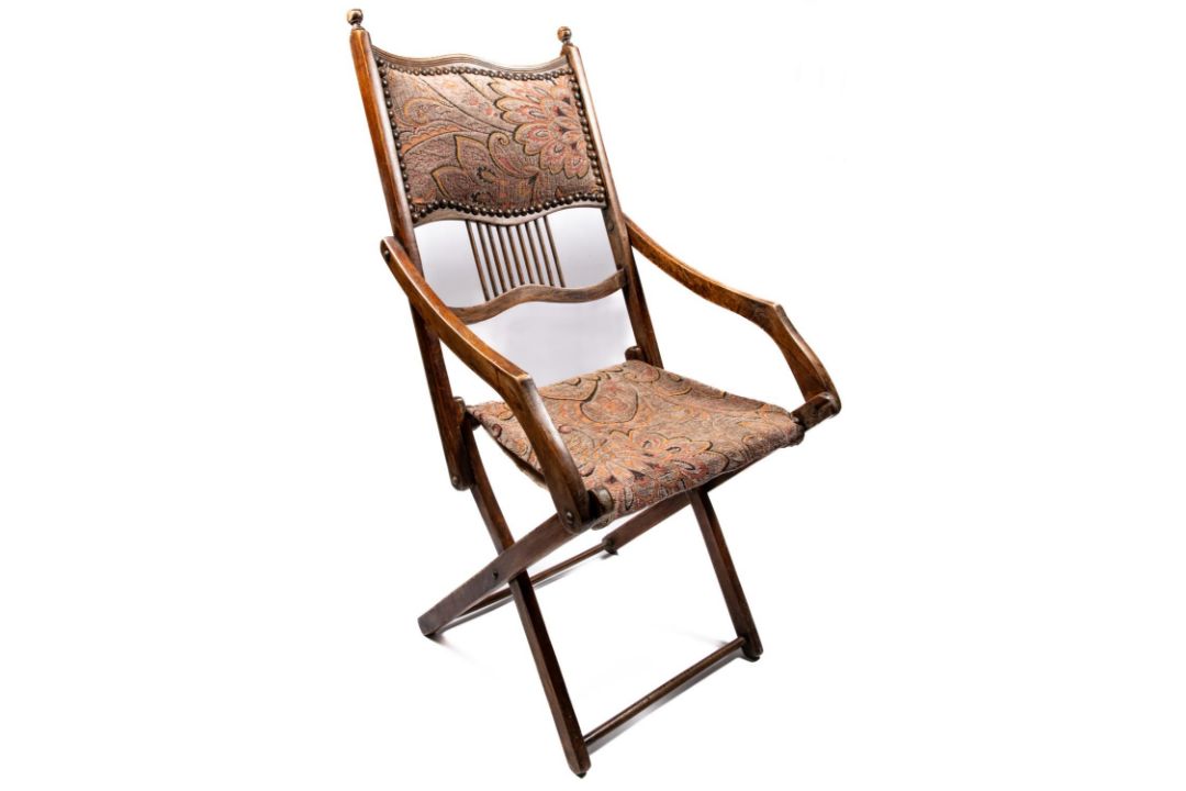 A Victorian mahogany folding campaign chair, with studded and tapestry embroidered head panel, - Image 1 of 5