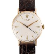 A GENTLEMAN'S SIZE 9CT SOLID GOLD ROLEX WRIST WATCH CIRCA 1950s WITH 