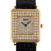 A FINE GENTLEMAN'S SIZE 18K SOLID GOLD & PAVE SET DIAMOND PIAGET WRIST WATCH CIRCA 1980s, REF. 99145