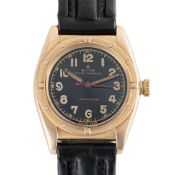 A GENTLEMAN'S SIZE 14K SOLID GOLD ROLEX OYSTER PERPETUAL 