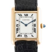 A GENTLEMAN'S SIZE 18K SOLID GOLD CARTIER PARIS TANK LOUIS MECANIQUE WRIST WATCH CIRCA 1980s