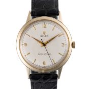 A GENTLEMAN'S LARGE SIZE 9CT SOLID GOLD ROLEX WRIST WATCH CIRCA 1950s, REF. 13874 Movement: 15J,