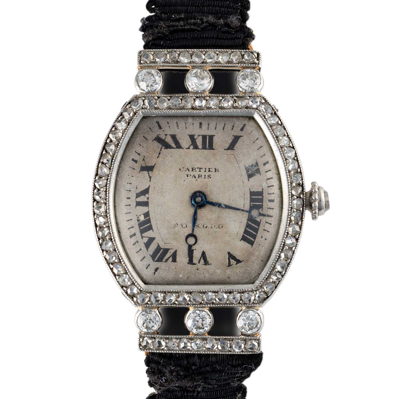 A FINE LADIES PLATINUM & 18K SOLID GOLD DIAMOND CARTIER TORTUE WRIST WATCH CIRCA 1930s Movement: