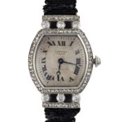 A FINE LADIES PLATINUM & 18K SOLID GOLD DIAMOND CARTIER TORTUE WRIST WATCH CIRCA 1930s Movement:
