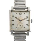 A RARE GENTLEMAN'S SIZE STAINLESS STEEL SQUARE CASED ROLEX PRECISION WRIST WATCH CIRCA 1959, REF.