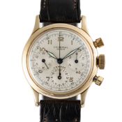 A GENTLEMAN'S SIZE 14K SOLID GOLD UNIVERSAL GENEVE COMPAX 