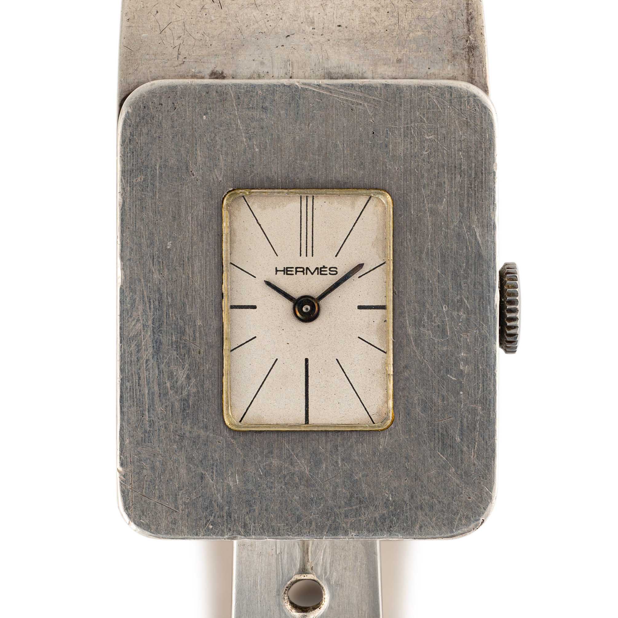 A VERY RARE SOLID SILVER HERMES BRACELET WATCH CIRCA 1970s, MADE BY JAEGER Movement: Manual wind,
