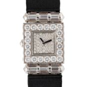 A LADIES 18K WHITE GOLD & DIAMOND CHANEL MATELASSE WRIST WATCH CIRCA 2000s Movement: Quartz. Case: