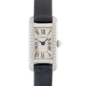 A LADIES 18K SOLID WHITE GOLD & DIAMOND CARTIER TANK MINI ALLONGEE WRIST WATCH DATED 2003, REF. 2525