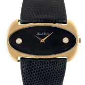 A RARE OVERSIZED 18K SOLID GOLD & DIAMOND BUECHE GIROD WRIST WATCH CIRCA 1970s Movement: 17J, manual