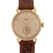 A GENTLEMAN'S SIZE 18K SOLID YELLOW GOLD PATEK PHILIPPE CALATRAVA WRIST WATCH DATED 1941, WITH PATEK