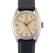 A MID SIZE STAINLESS STEEL ROLEX OYSTERDATE PRECISION WRIST WATCH CIRCA 1950, REF. 6066 WITH 