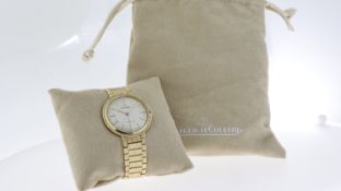 VINTAGE 14K LE COULTRE CIRCA 1970S, circular cream dial with baton hour markers, integrated 14k