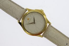 GUCCI G-TIMELESS QUARTZ WATCH REFERENCE 126.4 Approx 38mm stainless steel gold tone case with a snap