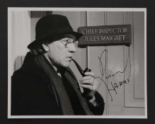 Richard Harris as Maigret,