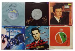 SIGNED 45rpm vinyl records,