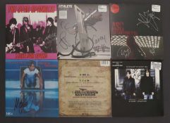 SIGNED (mainly rock) 45rpm vinyl records,