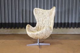 A wicker egg chair after Arne Jacobsen for Fritz Hansen,
