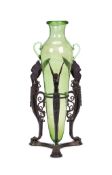 A late 19th century French Empire style green glass amphora on a patinated bronze triform base