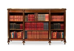 A late 19th century French Napoleon III mahogany and brass breakfront open bookcase