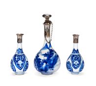 A small pair of Chinese Kangxi blue and white bottles with Turkish silver mounts and another