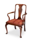 A George I walnut open armchair