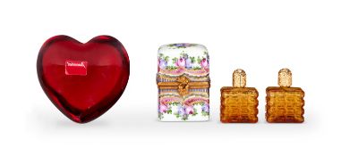 A Limoges porcelain perfume casket and a Baccarat paperweight