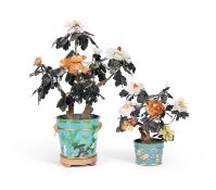 Two 20th century Chinese hardstone plants in cloisonne enamel plant pots