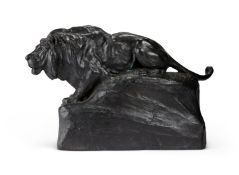 Johan Axel Wetterlund, (Sweden,1858-1927) A 19th century patinated bronze of a mountain lion
