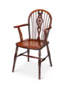 A 19th century ash and elm wheel-back Windsor armchair, Thames Valley
