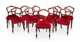 A set of ten Victorian carved walnut dining chairs by Joseph Loader & Co, London