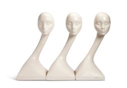 A set of three vintage fibre-glass swan-neck mannequin display heads in the manner of Seba