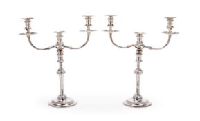 A pair of Garrard & Co Ltd silver three-light candelabra